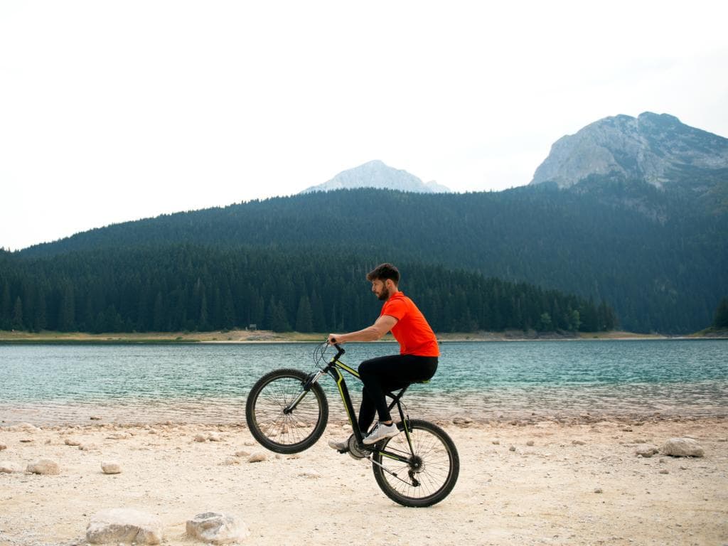 Guy biking L